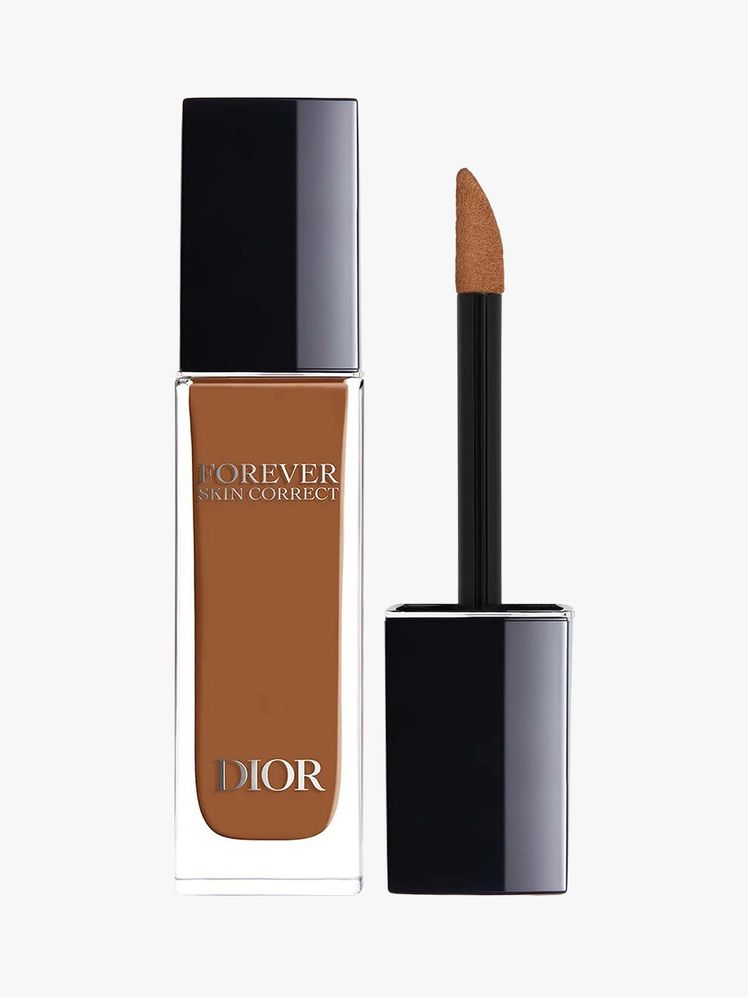 Dior Forever Skin Correct Full-Coverage Concealer brown bottle with black top and black applicator on light grey background