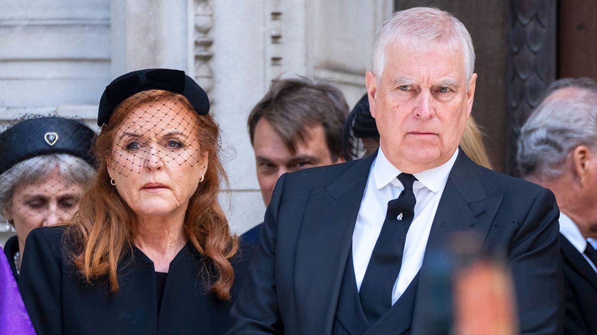 Ex-Prince Andrew and Sarah Ferguson looking concerned and serious outside a church wearing black.
