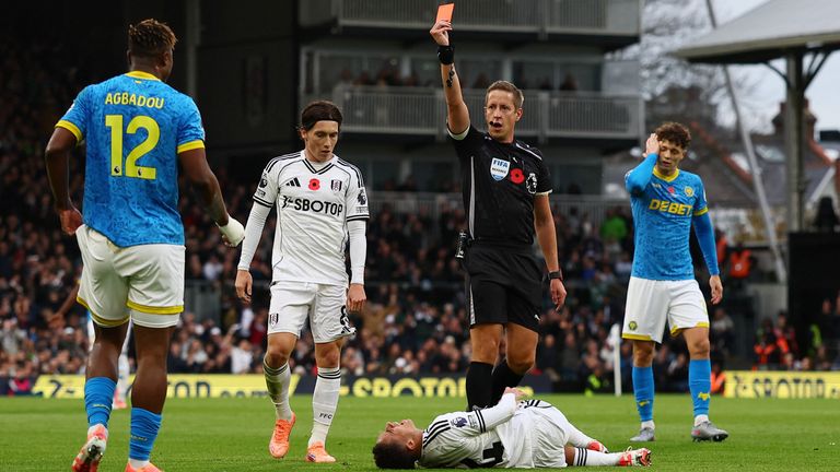 Wolves' defender Emmanuel Agbadou is shown a red card during Saturday's 3-0 loss against Fulham. Pic: Reuters