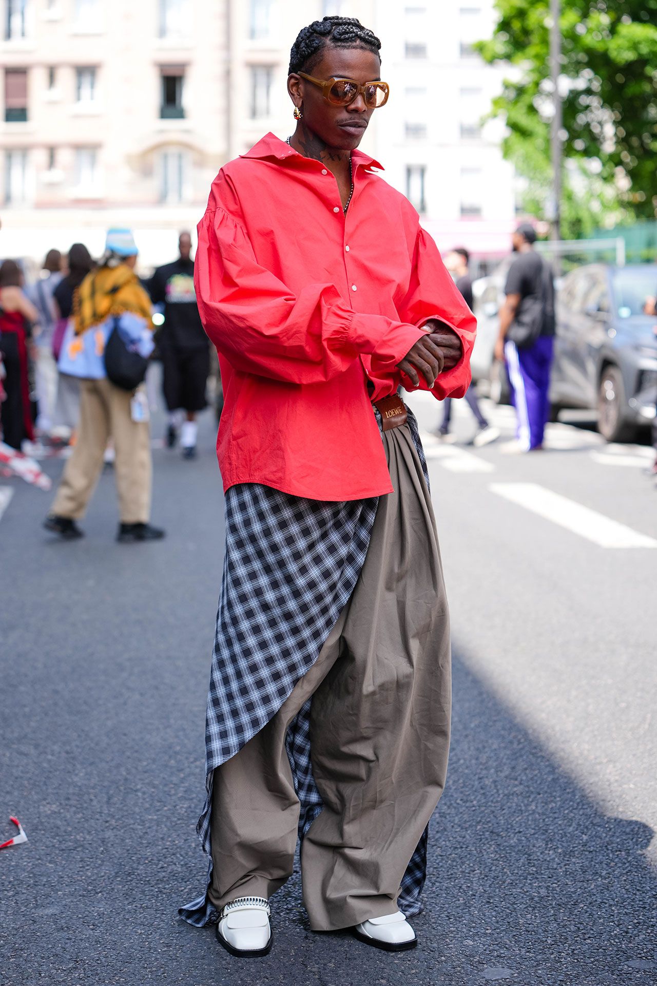 Image may contain Koba LaD Pedestrian Person Clothing Coat Sleeve Pants Standing Adult Accessories and Bag