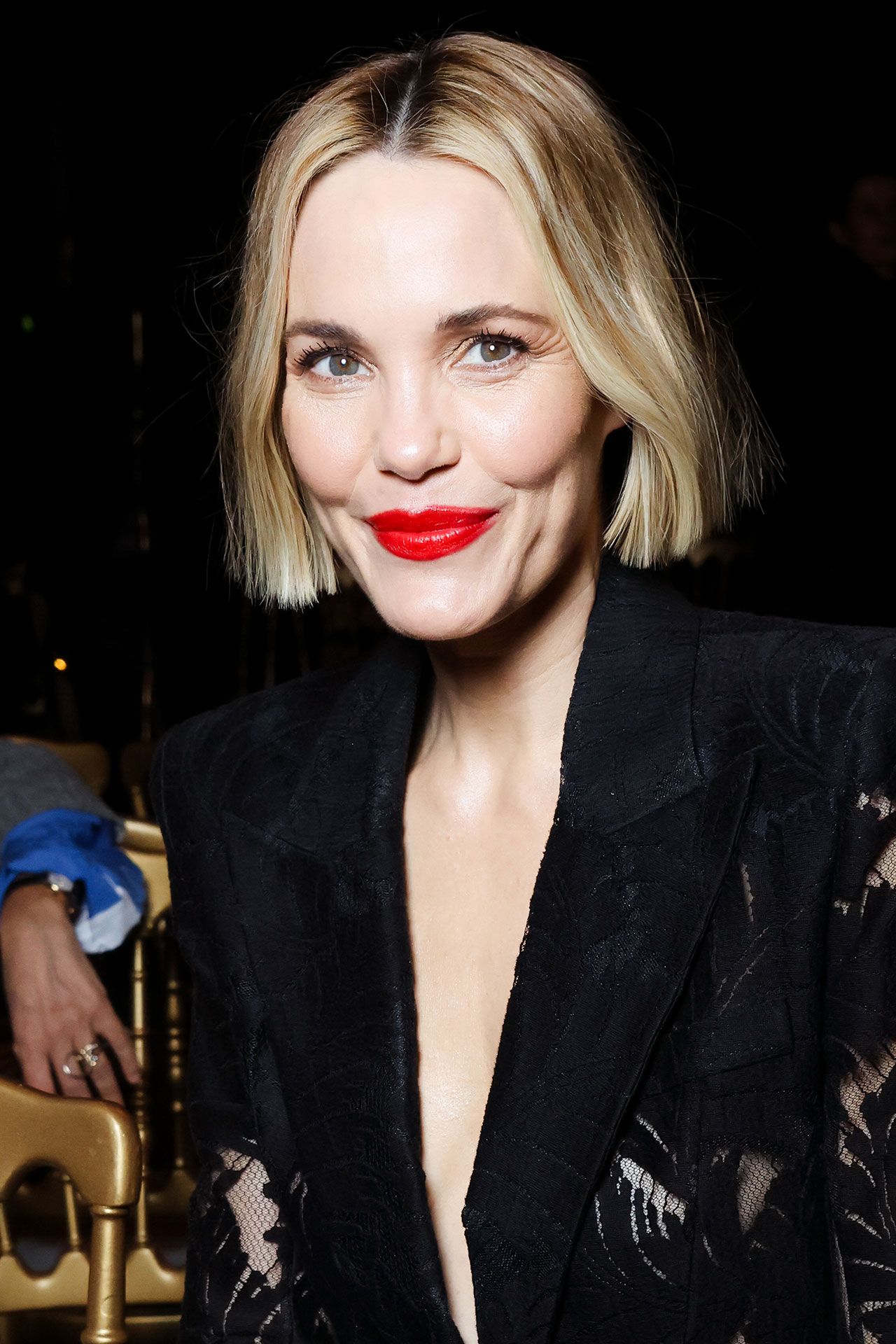 Image may contain Leslie Bibb Blonde Hair Person Adult Face Head Photography Portrait Baby Clothing and Coat