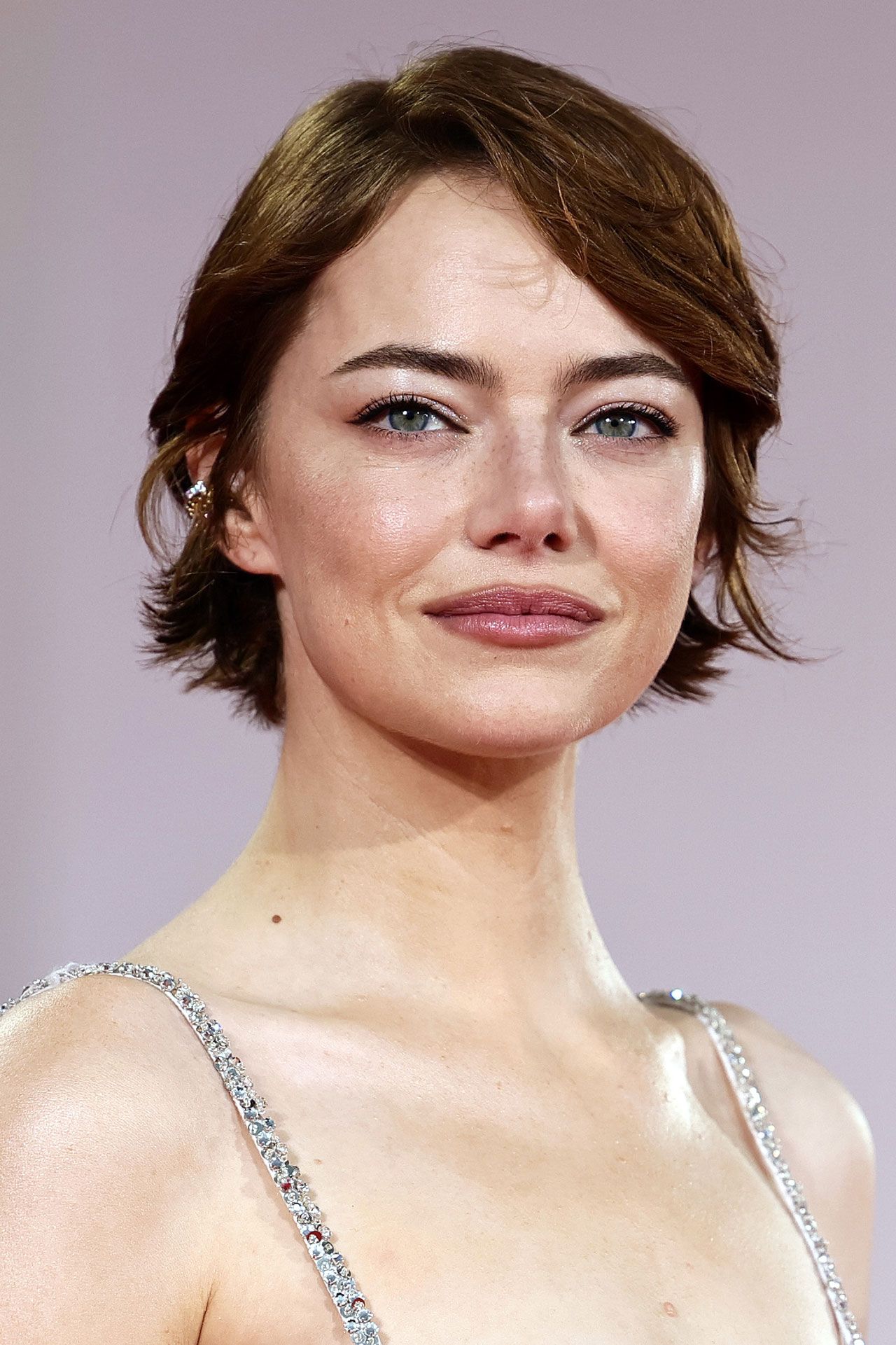 Image may contain Emma Stone Body Part Face Head Neck Person Photography Portrait and Adult
