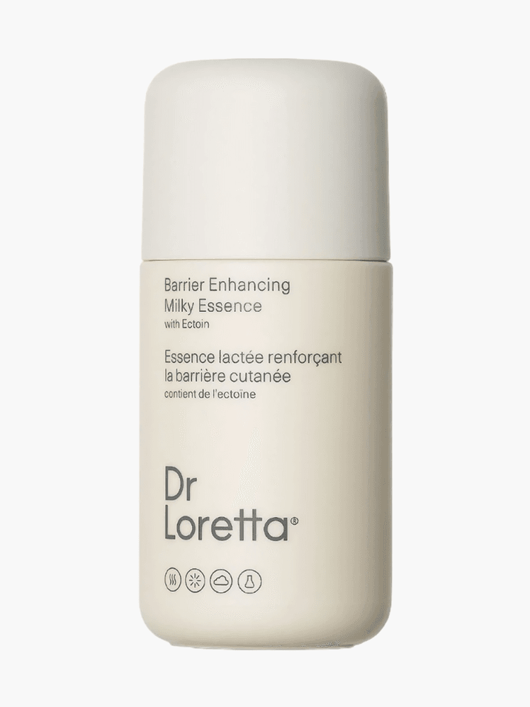 Barrier Enhancing Milky Essence in branded light beige bottle with cap on light gray background