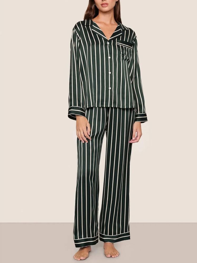 Image may contain: Clothing, Formal Wear, Suit, and Pajamas