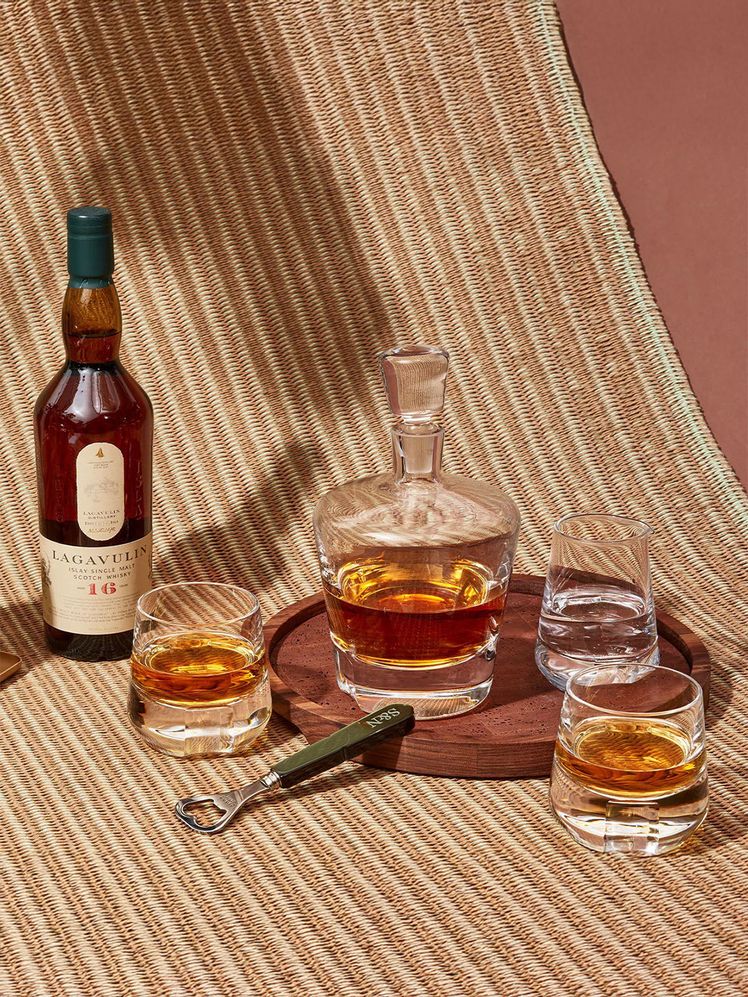 Image may contain: Alcohol, Beverage, Liquor, Whisky, Bottle, Cosmetics, Perfume, Food, and Ketchup