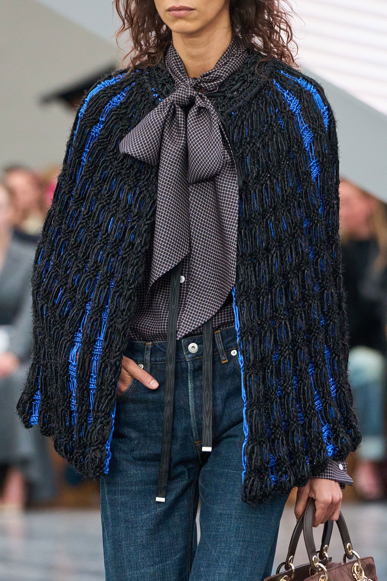 Image may contain Clothing Knitwear Sweater Coat and Scarf