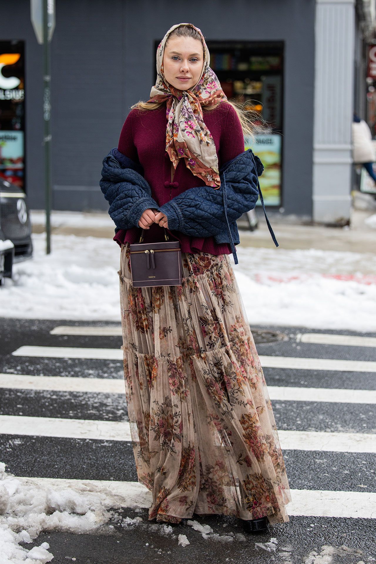 Image may contain Adult Person Pedestrian Clothing Scarf Accessories Bag and Handbag