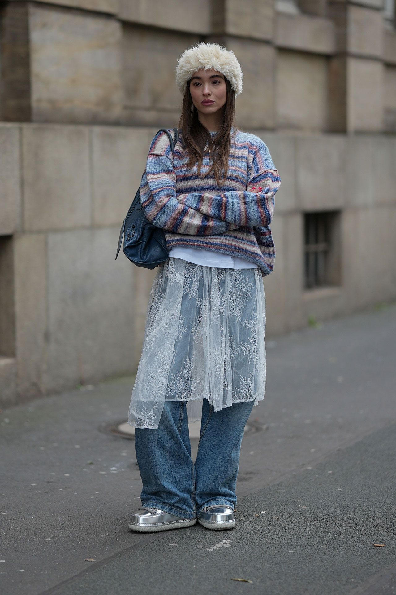 Image may contain Clothing Pants Jeans Adult Person Knitwear Sweater Hair and Blonde