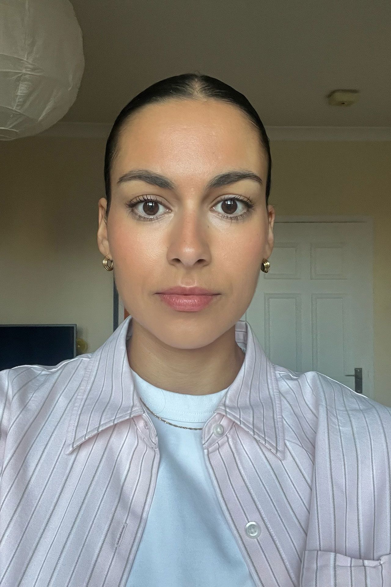 Image may contain Body Part Face Head Neck Person Adult Computer Hardware Electronics Hardware Monitor and Screen