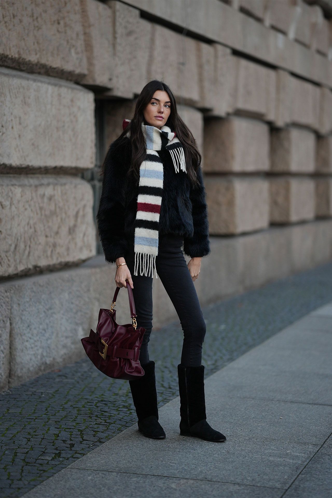 Image may contain Jourdan Miller Clothing Pants Jeans Coat Scarf Accessories Bag and Handbag