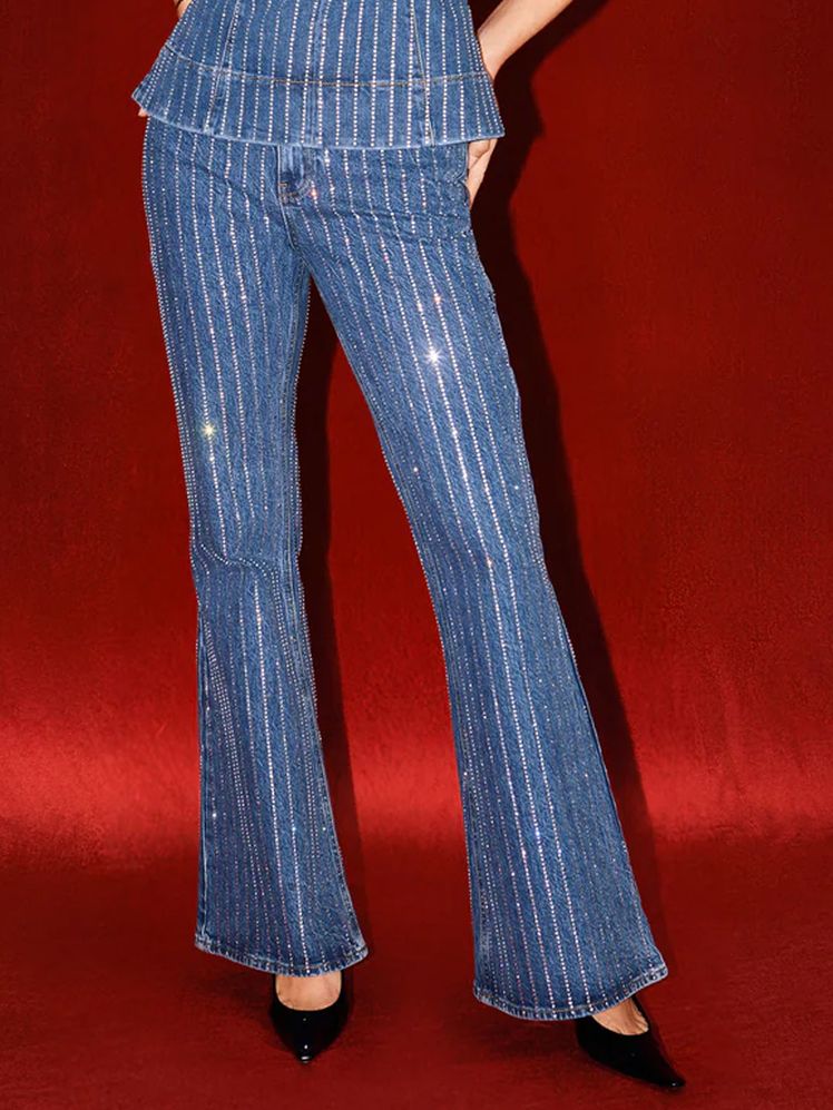 Image may contain: Clothing, Pants, Jeans, Footwear, and Shoe