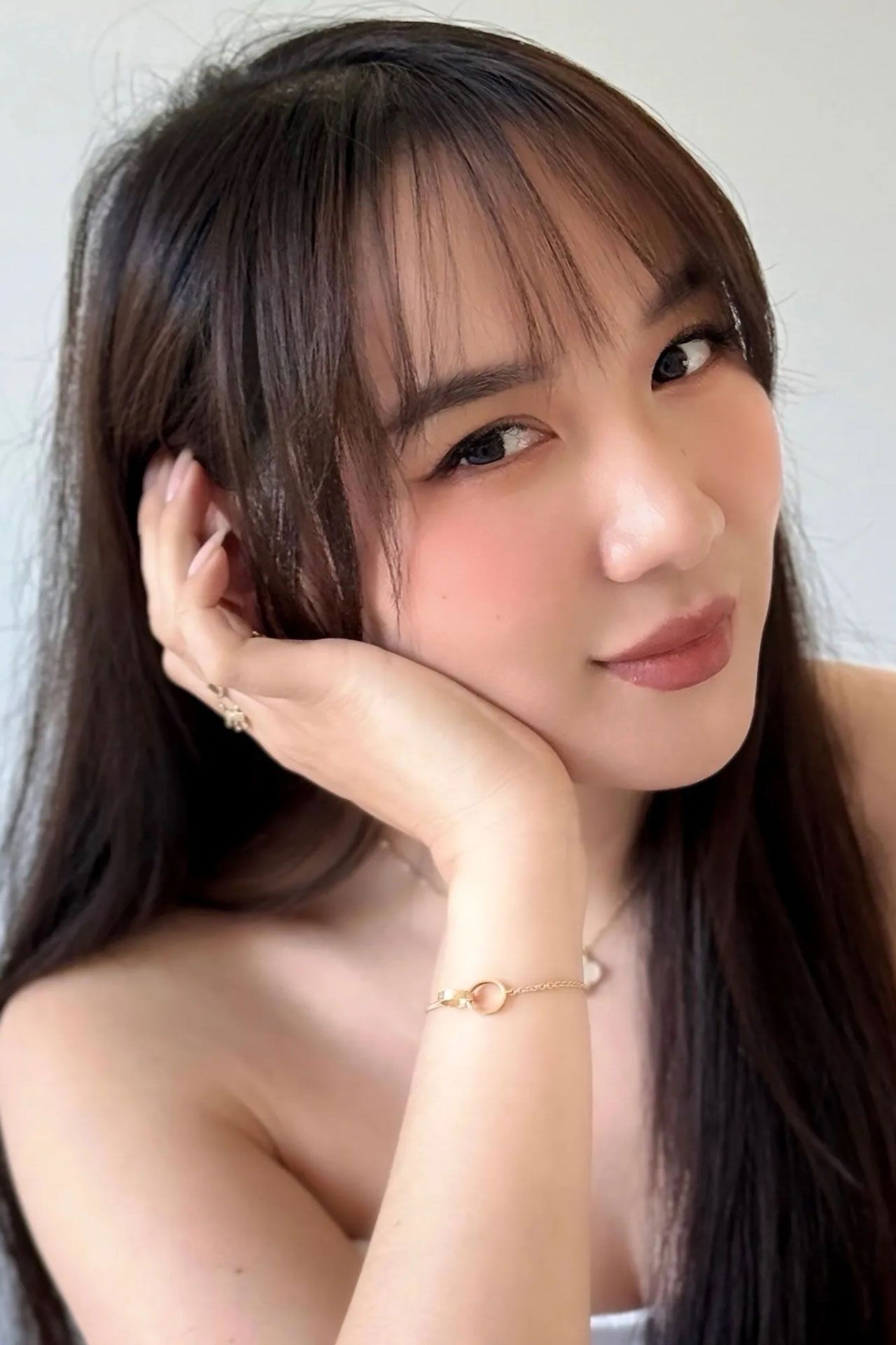 Image may contain Head Person Face Happy Smile Teen Brown Hair and Hair