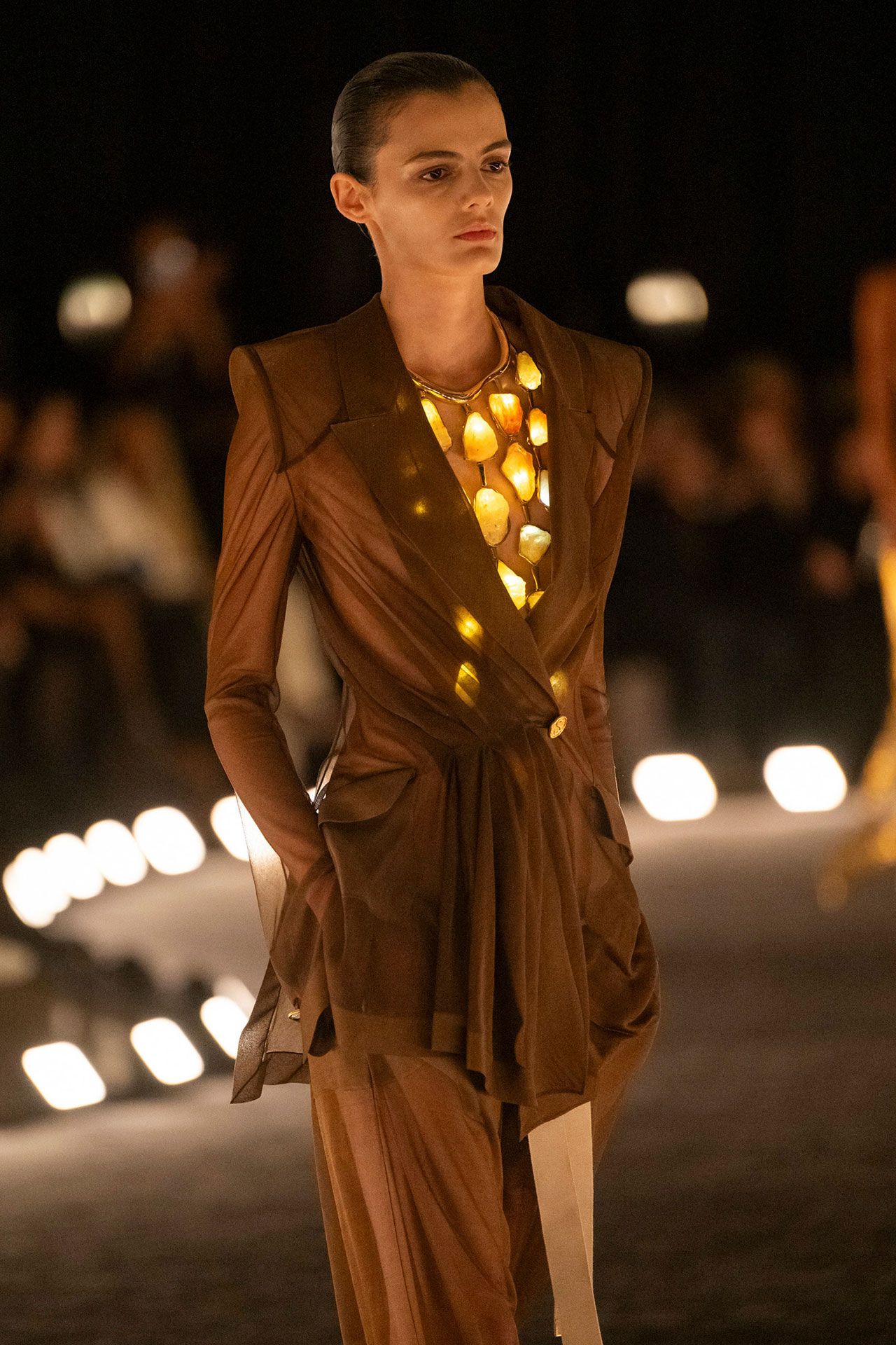 Image may contain Fashion Clothing Long Sleeve Sleeve Formal Wear Suit Person Coat Jacket and Runway