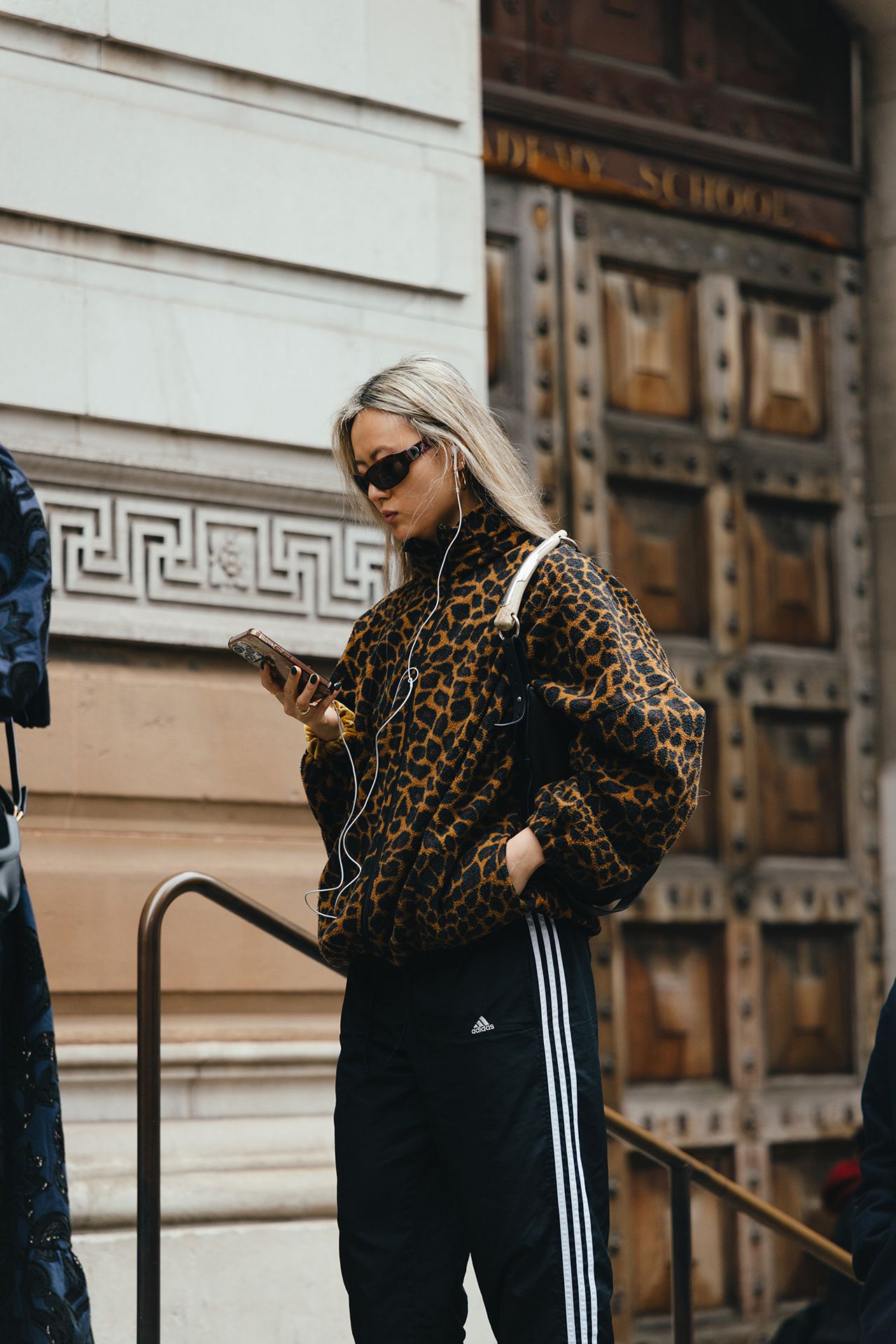 Image may contain Adult Person Performer Solo Performance Blonde Hair Clothing Coat and Jacket