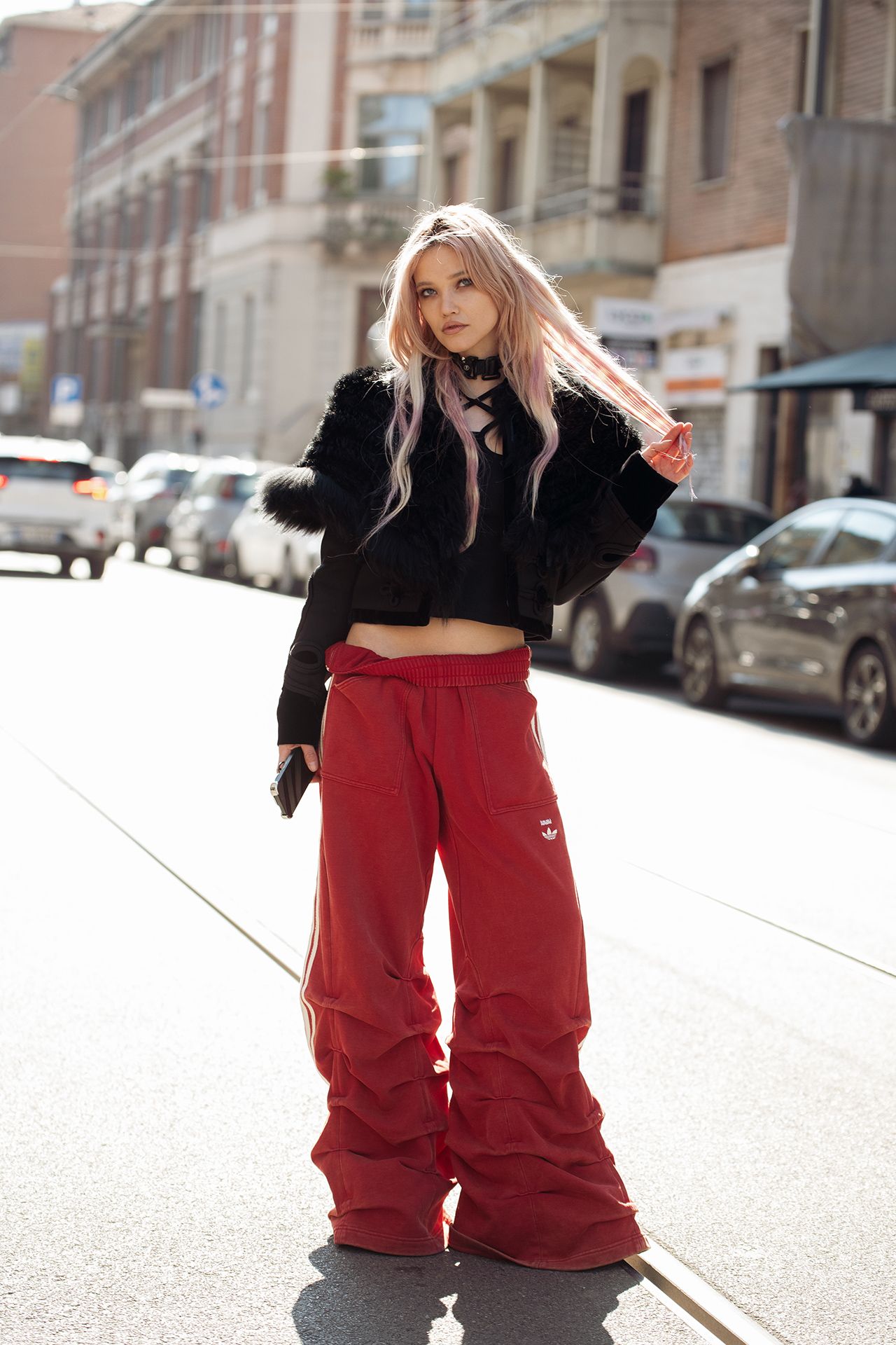 Image may contain Clothing Pants Coat Jacket Blonde Hair Person Car Transportation Vehicle City Blazer and Road