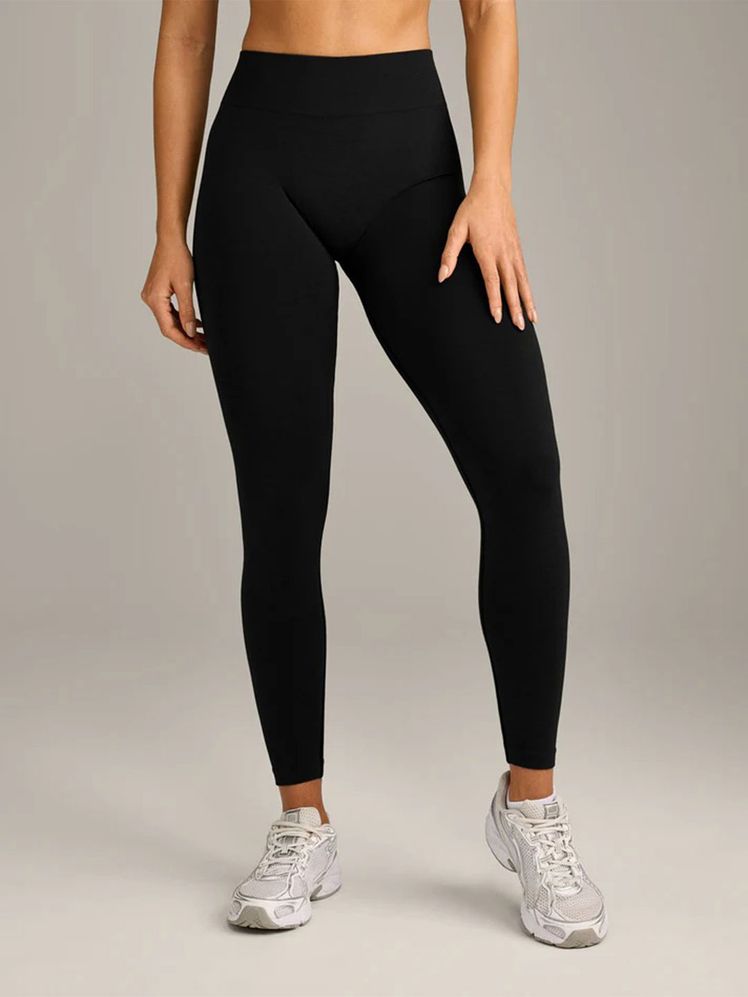 Image may contain: Clothing, Hosiery, Tights, Pants, Adult, and Person