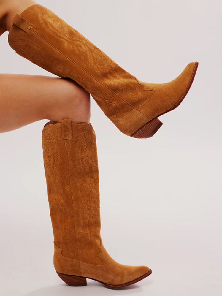 Image may contain: Clothing, Footwear, Shoe, Boot, Person, and High Heel