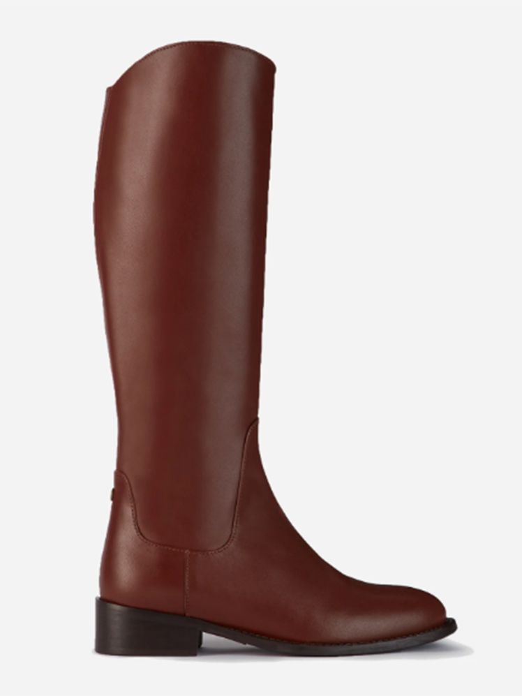 Image may contain: Boot, Clothing, Footwear, Riding Boot, and Shoe