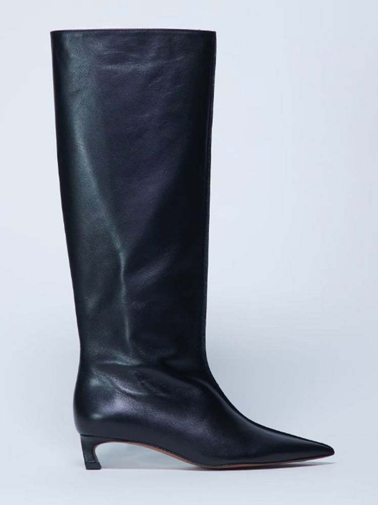 Image may contain: Boot, Clothing, Footwear, Riding Boot, and Shoe