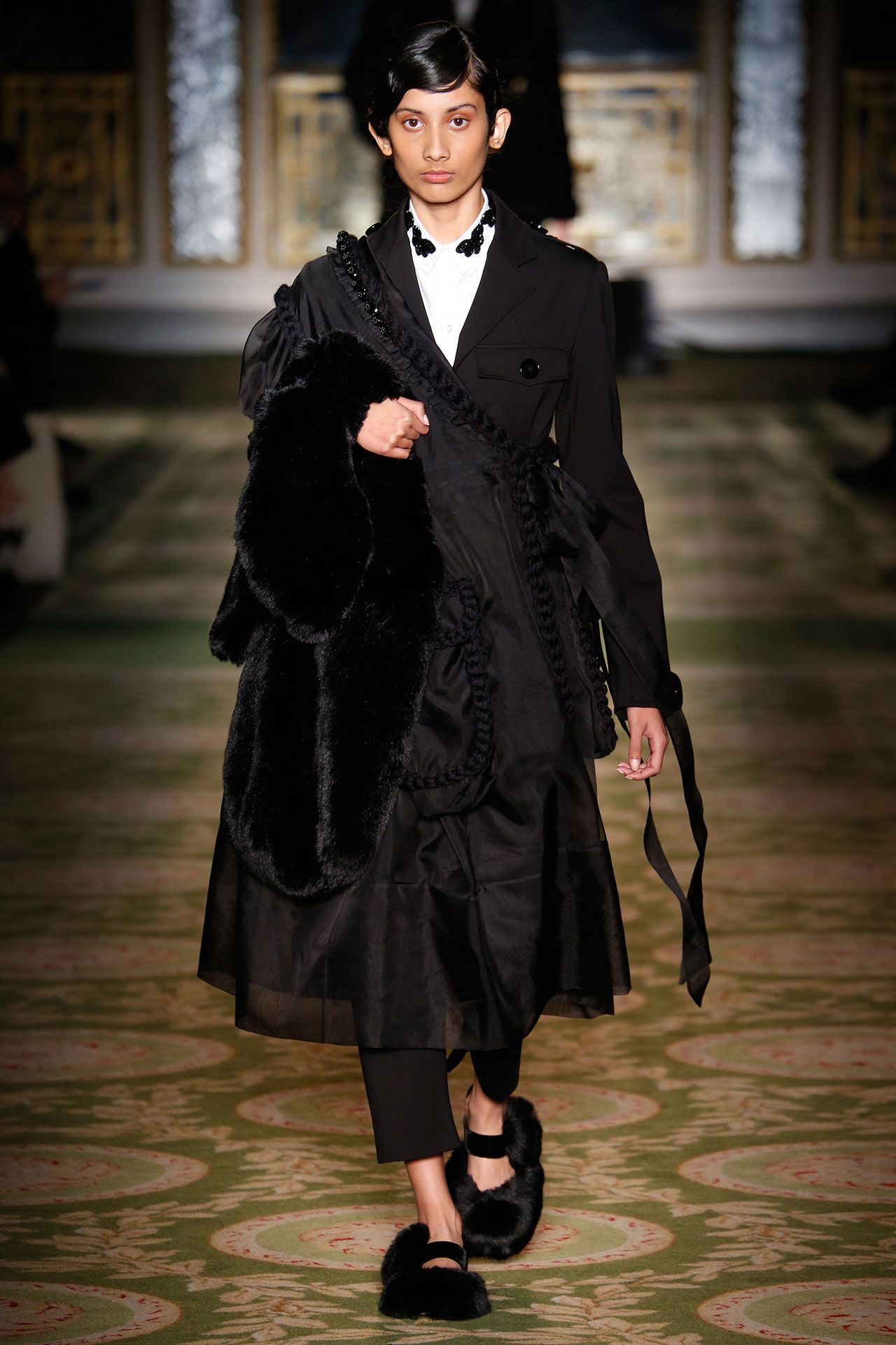 Image may contain Clothing Coat Person Adult Fashion and Overcoat