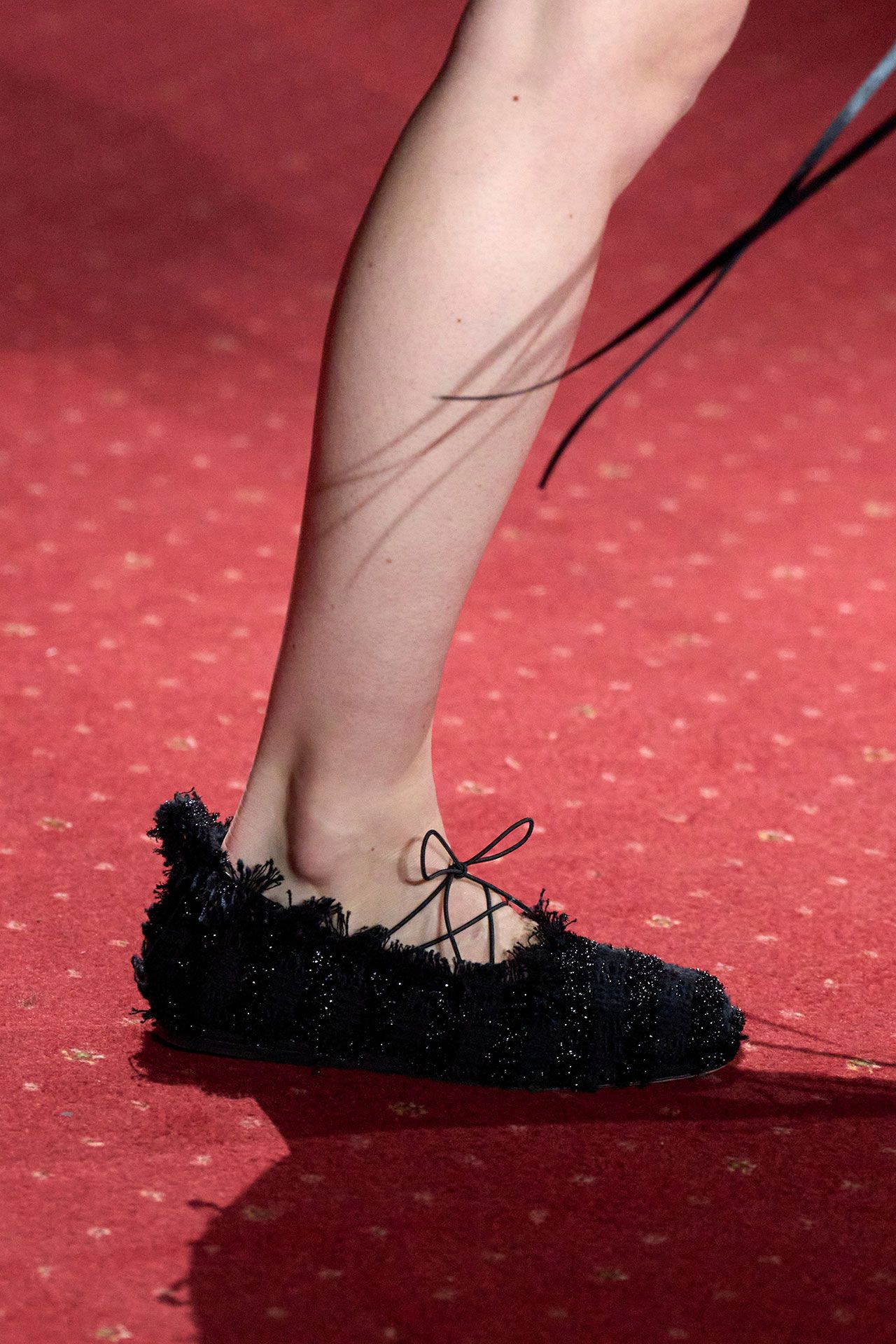 Image may contain Clothing Footwear Shoe Person Skin and Adult