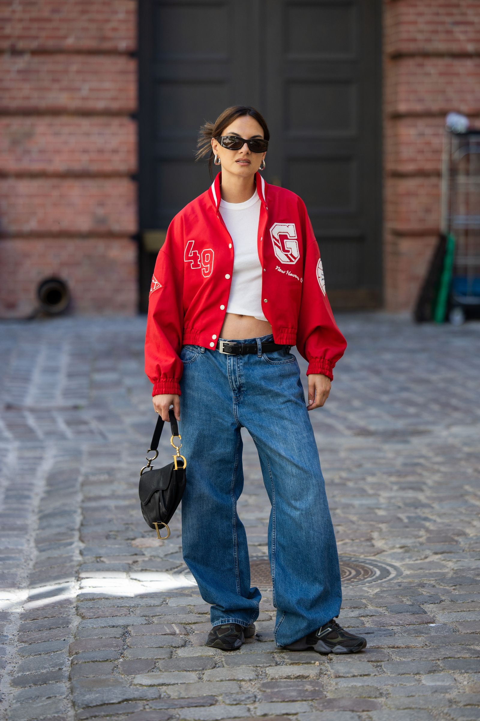 Image may contain Clothing Pants Jeans and Coat