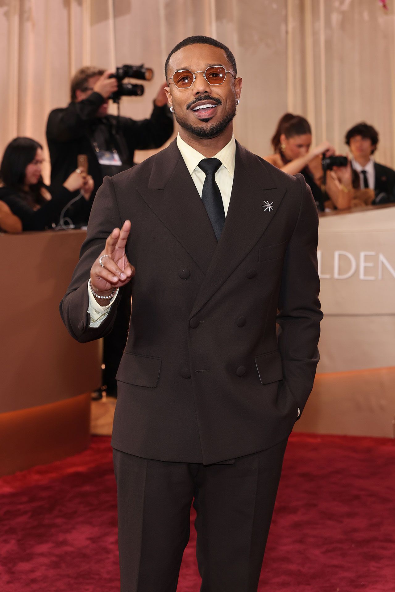 Image may contain Michael B. Jordan Shigeru So Clothing Formal Wear Suit Fashion Adult Person Head and Face