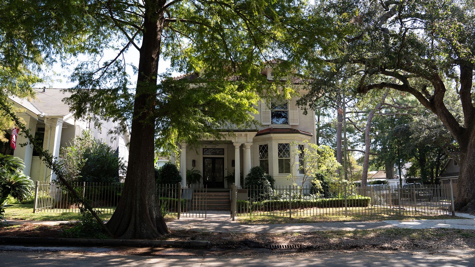Image may contain Architecture Building Housing House Nature Outdoors Yard and Portico