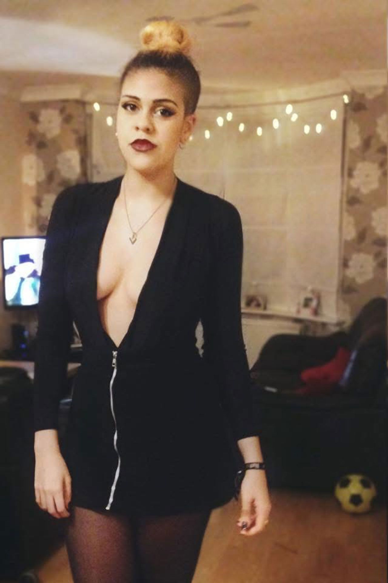 Image may contain Blazer Clothing Coat Jacket Adult Person Ball Football Soccer Soccer Ball Sport and Accessories