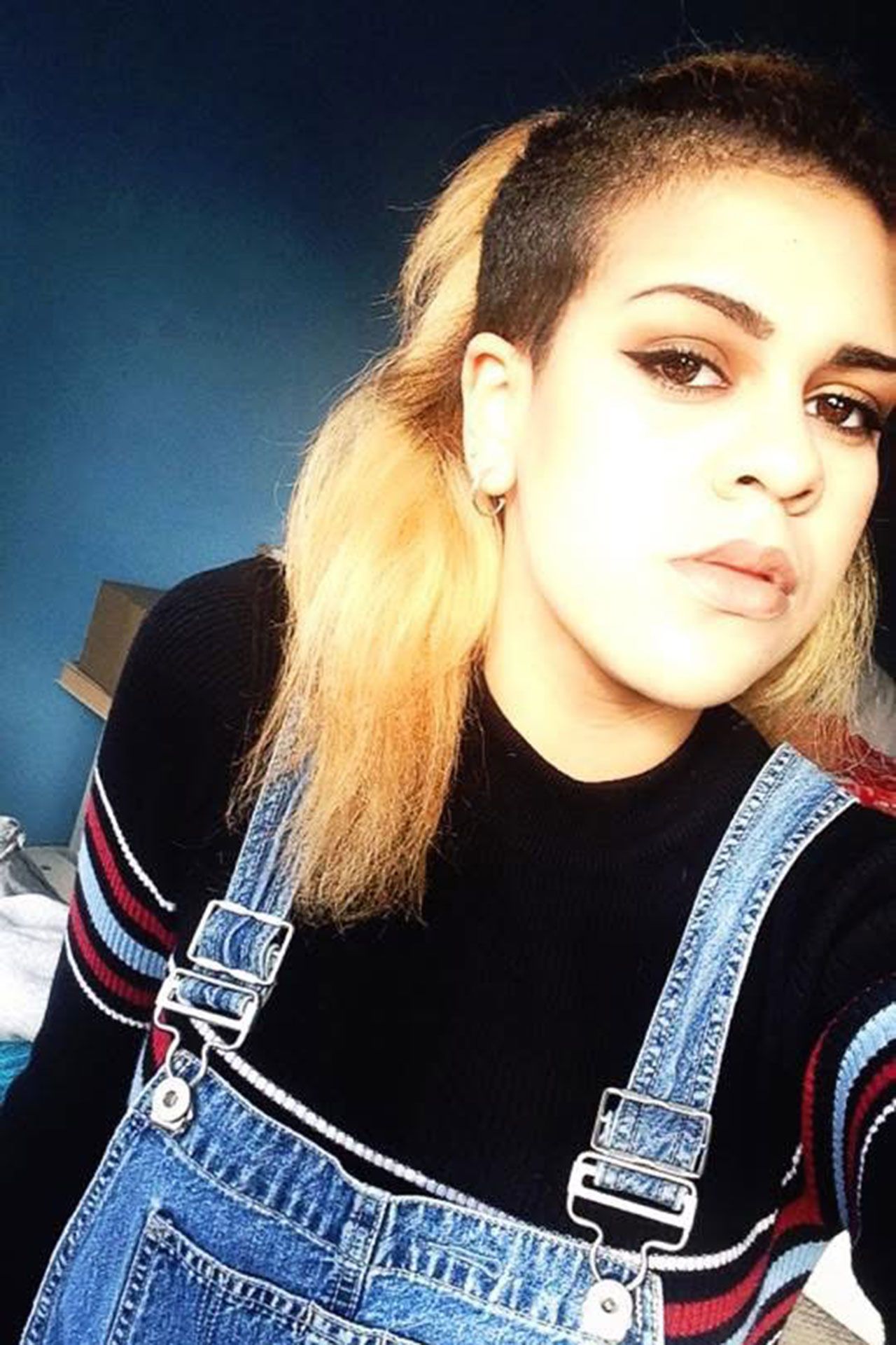 Image may contain Face Head Person Teen and Hair