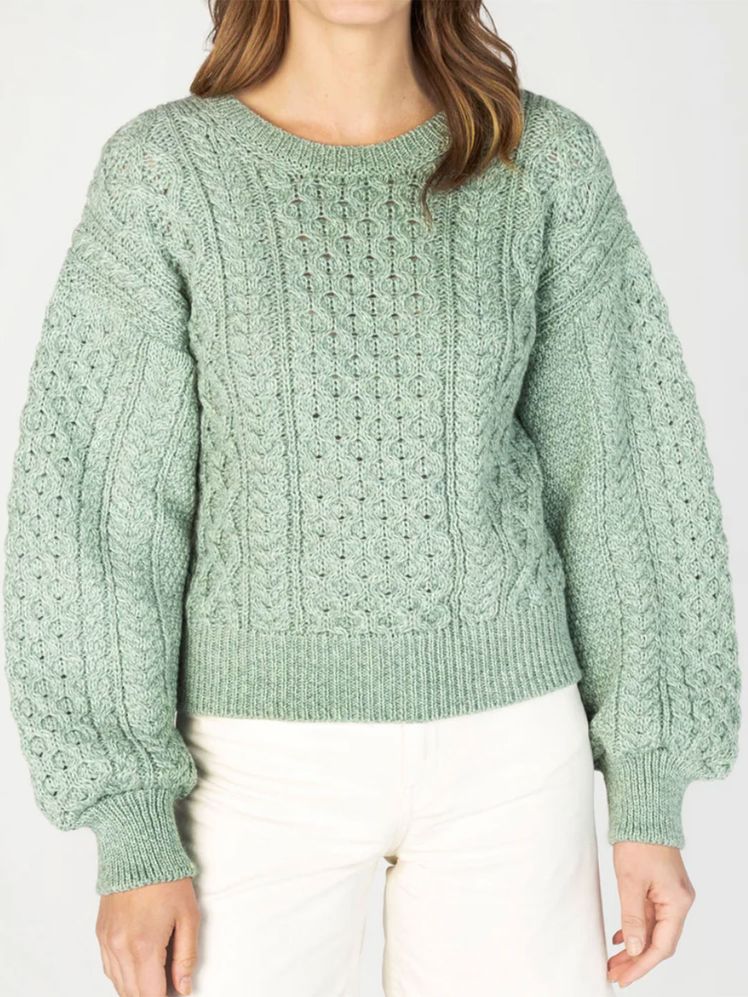 Image may contain: Clothing, Knitwear, and Sweater