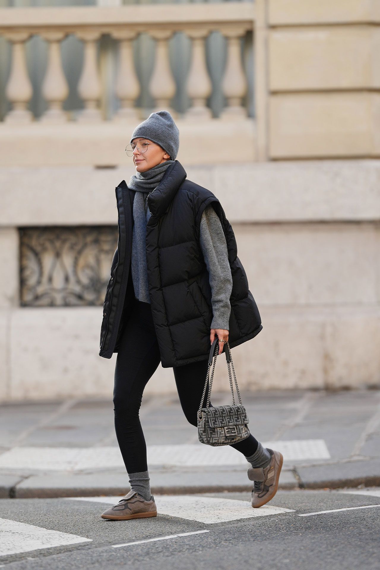 Image may contain Pedestrian Person Clothing Coat Walking Pants and Adult