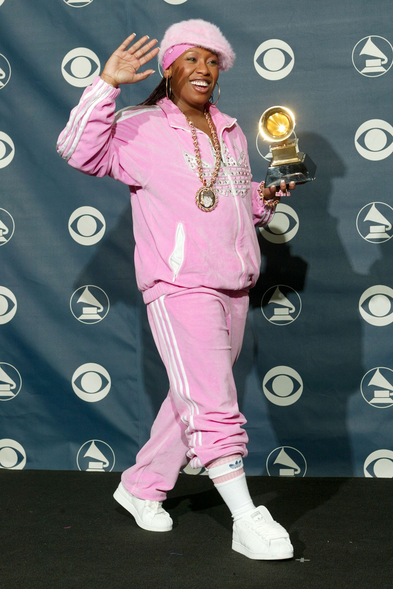 Image may contain Missy Elliott Performer Person Solo Performance Face Head Bottle Cosmetics Perfume and Clothing